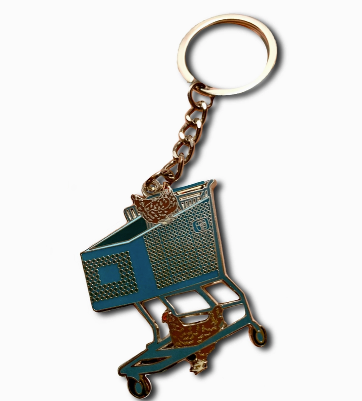 Metal keychain shaped like a shopping cart with a cat on a white background