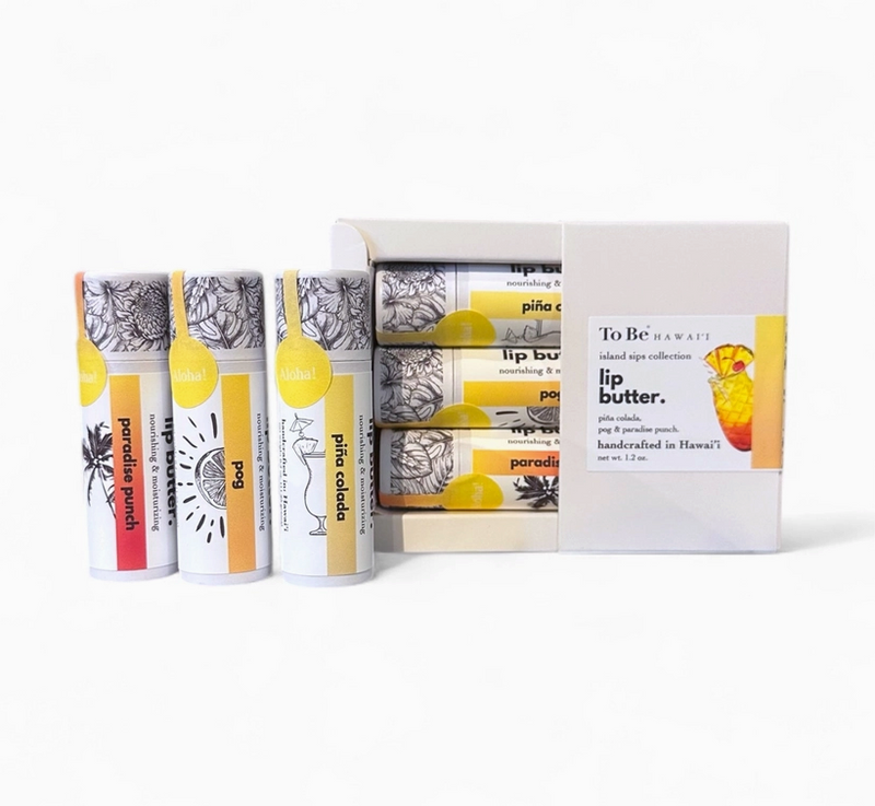 Collection of lip butter products with packaging on a white background