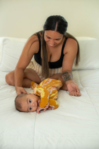 Long Sleeve Keiki Romper in Pumpkin Puakenikeni