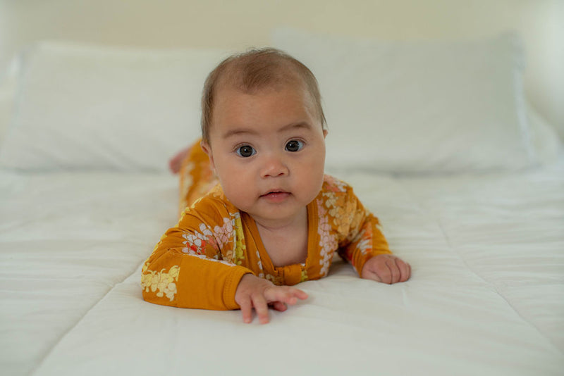 Long Sleeve Keiki Romper in Pumpkin Puakenikeni
