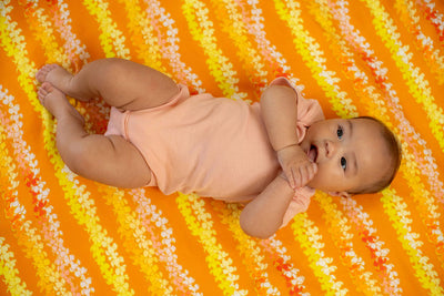 Pumpkin Puakenikeni Baby Swaddle