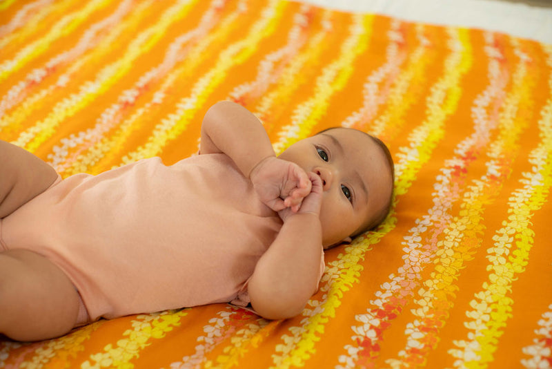 Pumpkin Puakenikeni Baby Swaddle