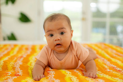 Pumpkin Puakenikeni Baby Swaddle