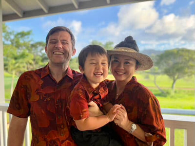 Womens red floral aloha dress on a red background