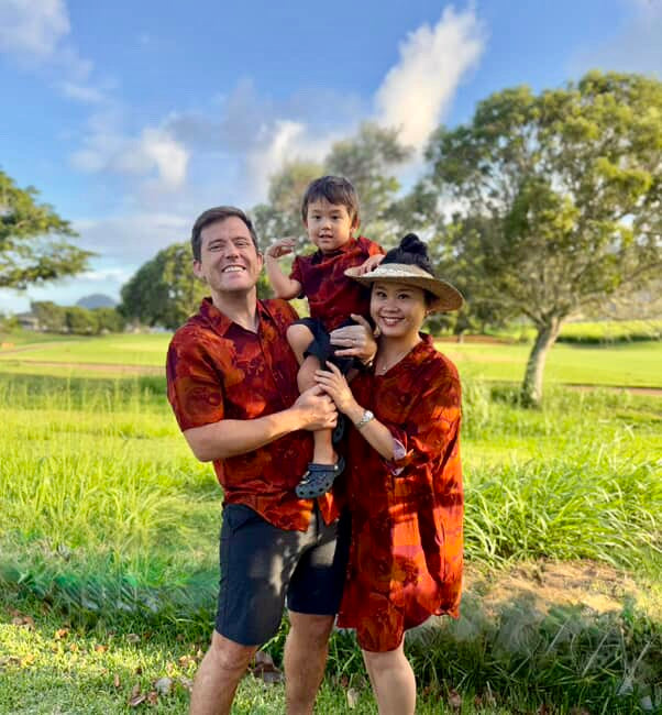 Womens red floral print aloha dress with a red background